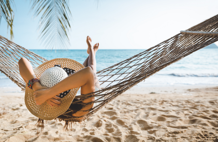 Woman on a hammock at the beach